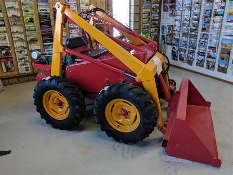 first bobcat skid steer